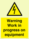 warning-work-in-progress-on-equipmentwith-electrical-hazard-symbol~